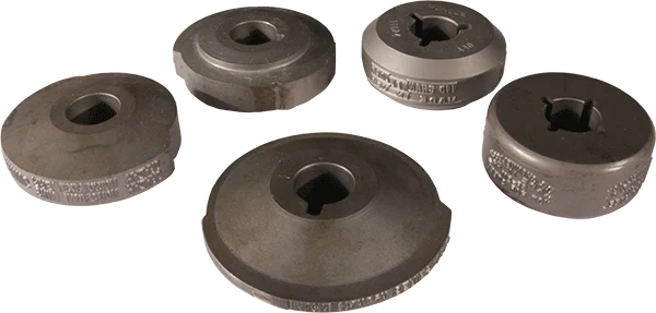 Five metal cam lobes with center bores and keyways displayed on a white background